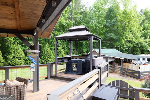 wooden deck with a gazebo