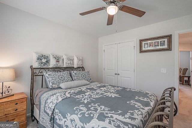 bedroom featuring carpet, a closet, and ceiling fan