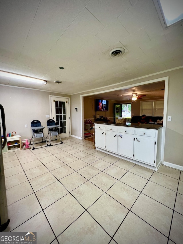 interior space with light tile patterned floors