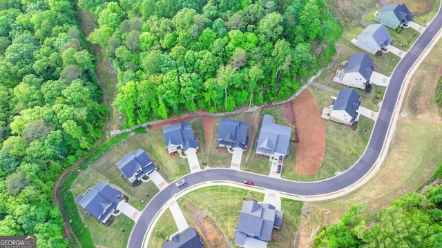 aerial overview of property's location with nearby suburban area