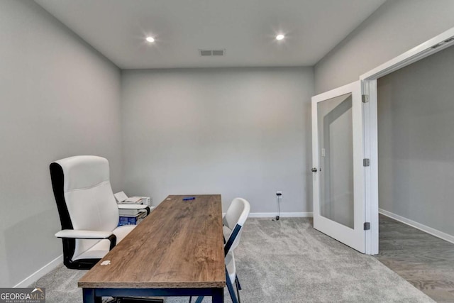 office space featuring french doors, baseboards, carpet flooring, and recessed lighting