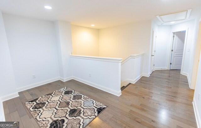 9872 Cameron Parc Cir, Johns Creek, GA 30022 - unfurnished room with wood-type flooring, attic access, recessed lighting, and baseboards