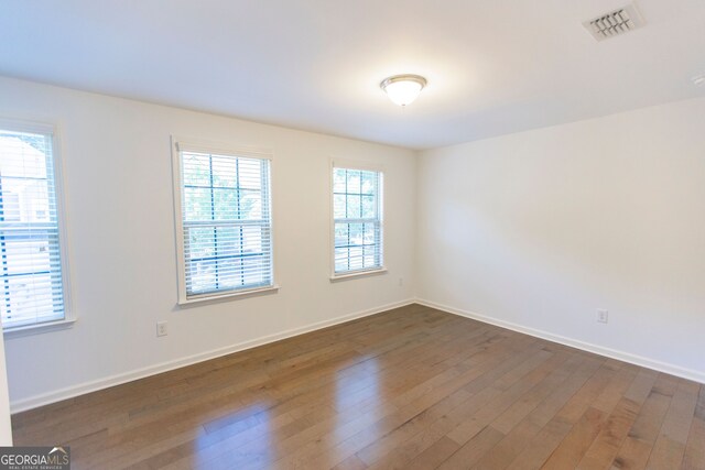 9872 Cameron Parc Cir, Johns Creek, GA 30022 - spare room with dark wood finished floors and baseboards