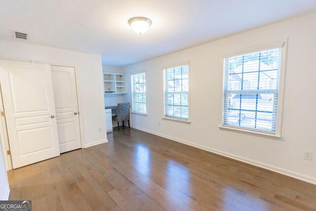 9872 Cameron Parc Cir, Johns Creek, GA 30022 - unfurnished bedroom featuring hardwood / wood-style floors and baseboards