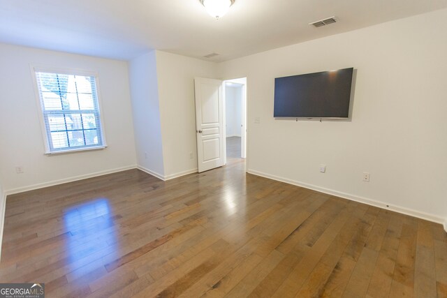 9872 Cameron Parc Cir, Johns Creek, GA 30022 - unfurnished room with hardwood / wood-style floors and baseboards