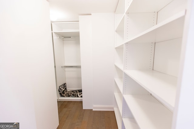 9872 Cameron Parc Cir, Johns Creek, GA 30022 - spacious closet featuring wood finished floors