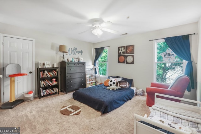 bedroom with carpet flooring and ceiling fan