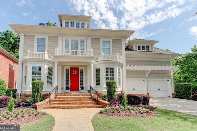 7520 Ledgewood Way, Suwanee, GA 30024 - view of front facade featuring concrete driveway and a balcony