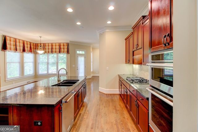 7520 Ledgewood Way, Suwanee, GA 30024 - kitchen featuring a sink, appliances with stainless steel finishes, crown molding, light wood-style flooring, and recessed lighting