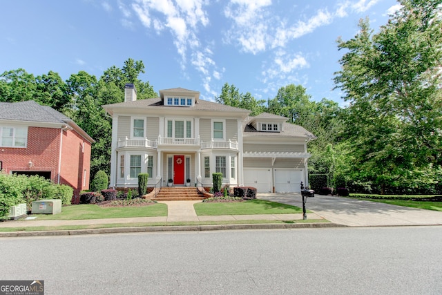 7520 Ledgewood Way, Suwanee, GA 30024 - view of front of house featuring driveway, a garage, and a chimney
