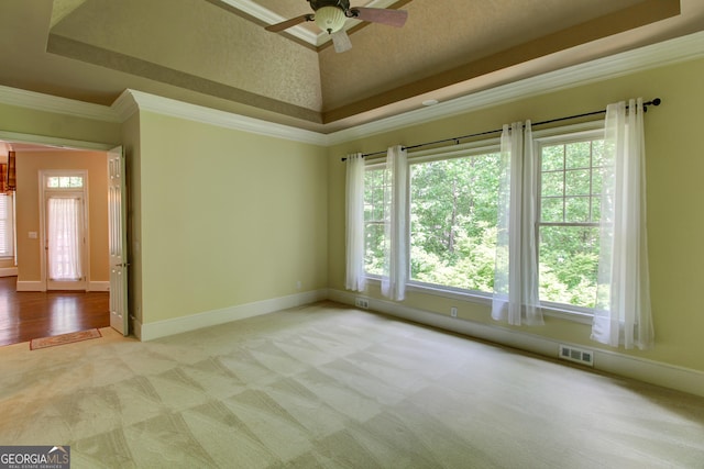 7520 Ledgewood Way, Suwanee, GA 30024 - empty room with a tray ceiling, carpet floors, ceiling fan, and ornamental molding