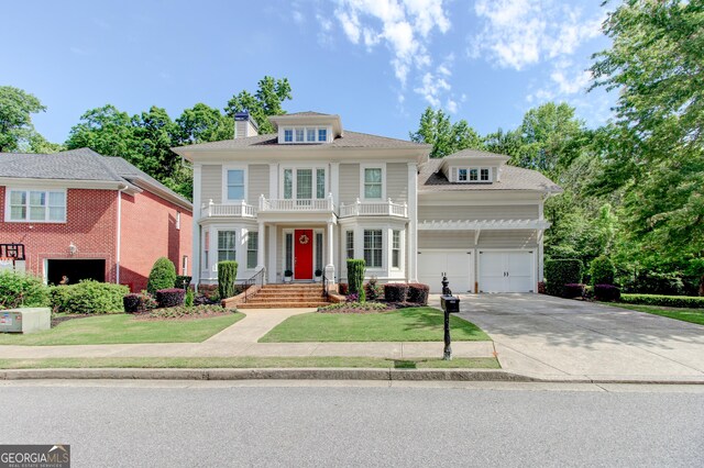 7520 Ledgewood Way, Suwanee, GA 30024 - traditional style home featuring concrete driveway, a front yard, a chimney, and a garage