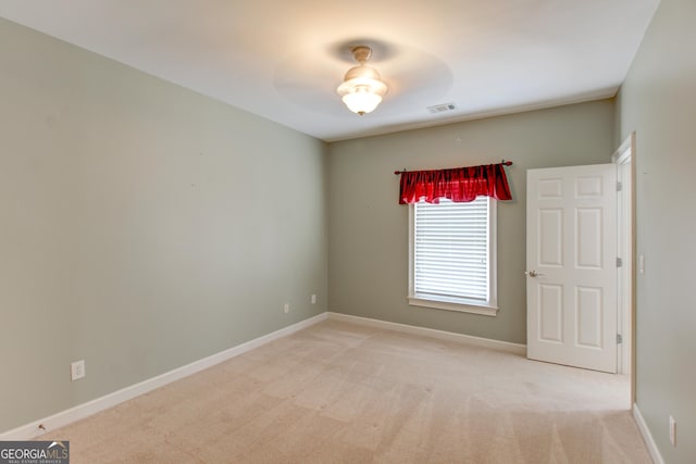 7520 Ledgewood Way, Suwanee, GA 30024 - empty room featuring light carpet and baseboards