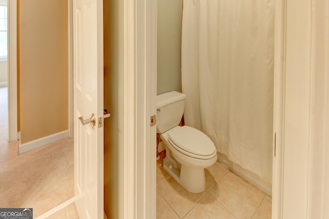 7520 Ledgewood Way, Suwanee, GA 30024 - full bathroom featuring toilet and tile patterned floors