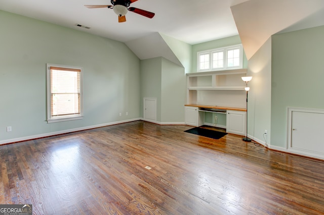 7520 Ledgewood Way, Suwanee, GA 30024 - unfurnished living room featuring ceiling fan, wood finished floors, and lofted ceiling