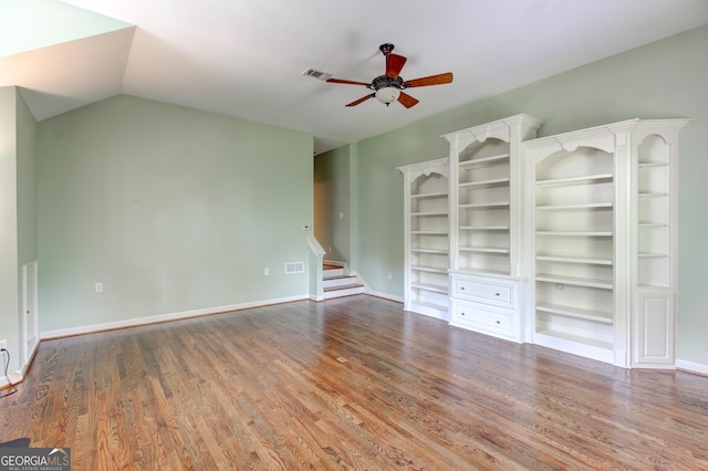 7520 Ledgewood Way, Suwanee, GA 30024 - unfurnished living room with a ceiling fan, wood finished floors, and stairs