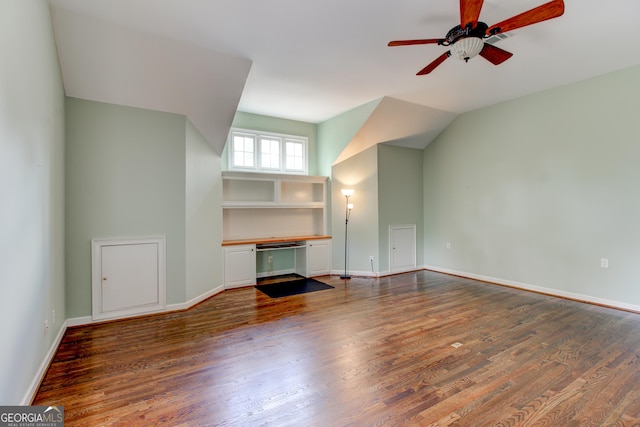 7520 Ledgewood Way, Suwanee, GA 30024 - unfurnished living room featuring a ceiling fan and wood finished floors