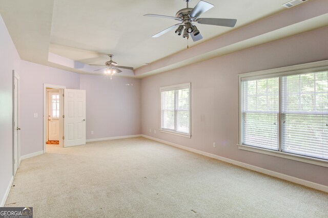 7520 Ledgewood Way, Suwanee, GA 30024 - carpeted empty room featuring a raised ceiling, a ceiling fan, and baseboards