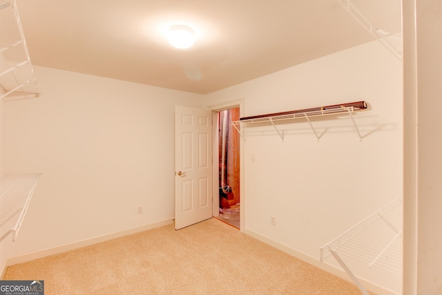 7520 Ledgewood Way, Suwanee, GA 30024 - walk in closet with light carpet