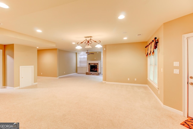 7520 Ledgewood Way, Suwanee, GA 30024 - unfurnished living room with light carpet, recessed lighting, and a brick fireplace
