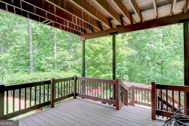 7520 Ledgewood Way, Suwanee, GA 30024 - wooden deck with a wooded view
