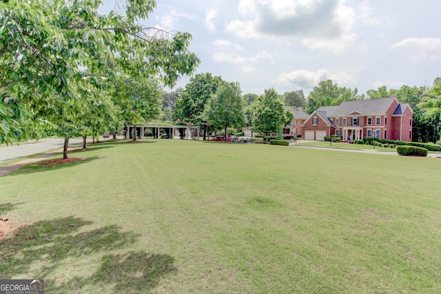 7520 Ledgewood Way, Suwanee, GA 30024 - view of community featuring a lawn