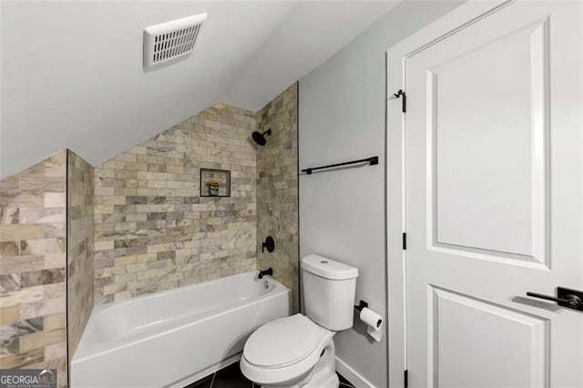 1571 Blvd Lorraine, Atlanta, GA 30311 - bathroom featuring vaulted ceiling, toilet, and bathtub / shower combination