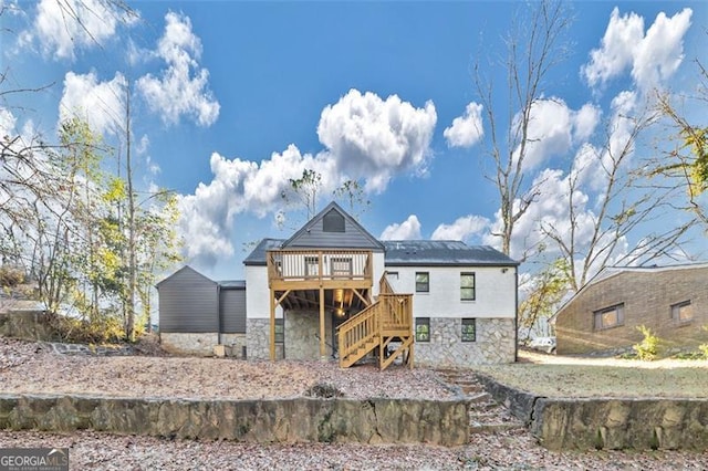 1571 Blvd Lorraine, Atlanta, GA 30311 - back of house featuring stone siding, a wooden deck, and stairs