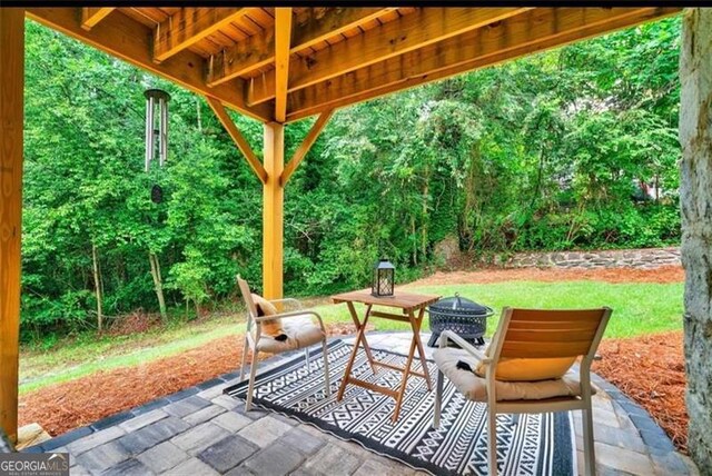 1571 Blvd Lorraine, Atlanta, GA 30311 - view of patio / terrace with an outdoor fire pit
