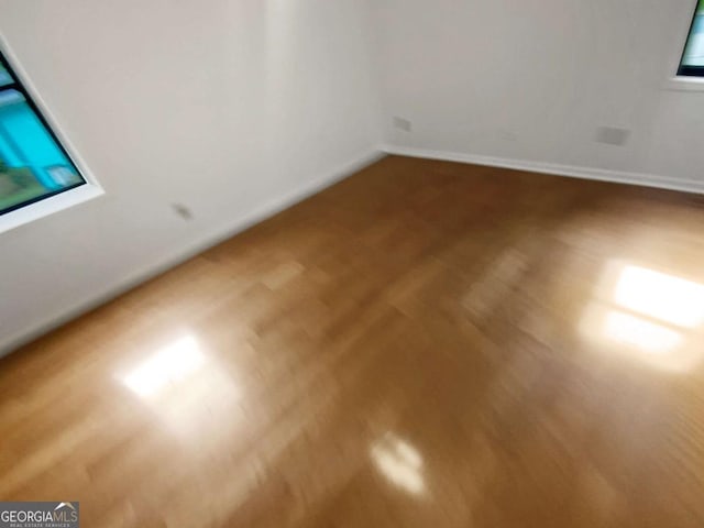 2325 Sebring Ct SW, Marietta, GA 30064 - empty room with baseboards and wood finished floors