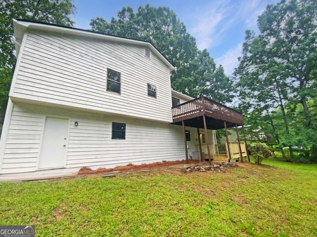2325 Sebring Ct SW, Marietta, GA 30064 - back of house with a yard and a wooden deck