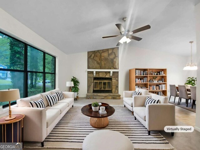 2325 Sebring Ct SW, Marietta, GA 30064 - living room with a ceiling fan, lofted ceiling, a chandelier, and a fireplace