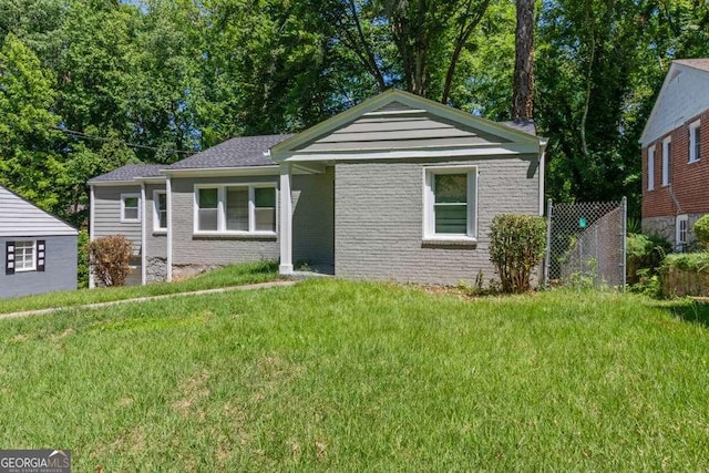 2025 Venetian Dr SW, Atlanta, GA 30311 - view of front of home featuring brick siding and a front lawn