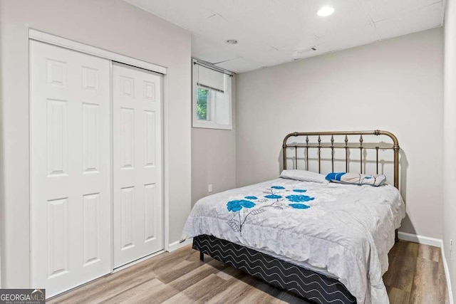2025 Venetian Dr SW, Atlanta, GA 30311 - bedroom featuring wood finished floors, baseboards, a closet, and recessed lighting