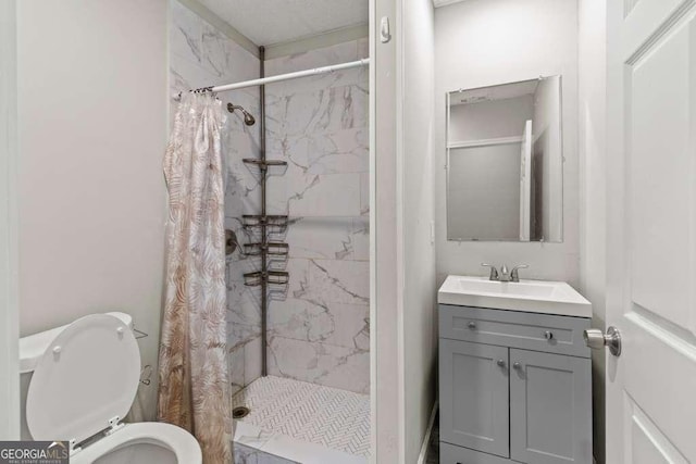 2025 Venetian Dr SW, Atlanta, GA 30311 - bathroom featuring a stall shower, vanity, and toilet