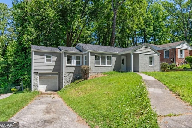 2025 Venetian Dr SW, Atlanta, GA 30311 - single story home with driveway, a garage, a front yard, and stone siding