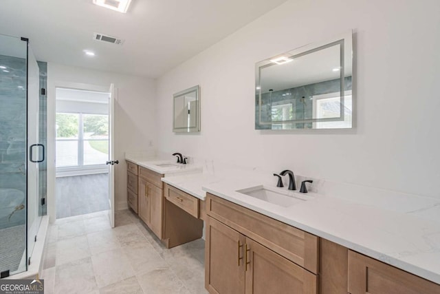 2265 Hillbriar Dr, Buford, GA 30518 - full bathroom with a shower stall, vanity, and tile patterned flooring