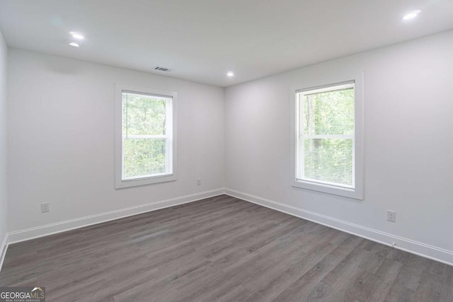 2265 Hillbriar Dr, Buford, GA 30518 - unfurnished room with plenty of natural light, dark wood-style floors, baseboards, and recessed lighting