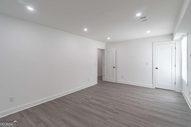 2265 Hillbriar Dr, Buford, GA 30518 - unfurnished room featuring wood finished floors, recessed lighting, and baseboards