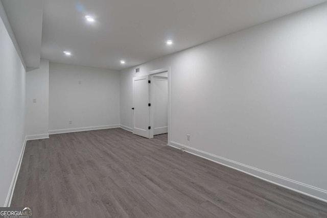 2265 Hillbriar Dr, Buford, GA 30518 - spare room featuring recessed lighting, dark wood-style floors, and baseboards