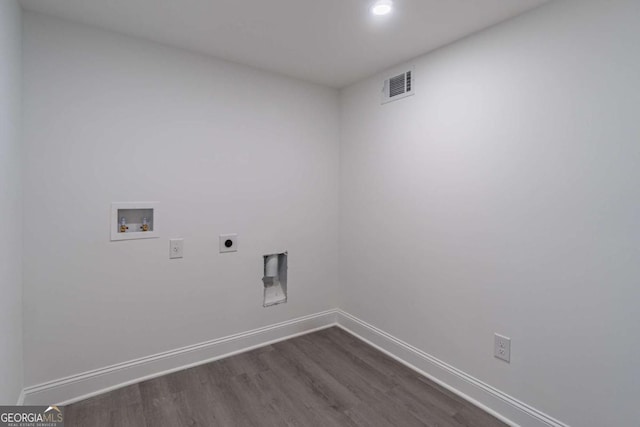 2265 Hillbriar Dr, Buford, GA 30518 - laundry room with washer hookup, hookup for an electric dryer, dark wood-style floors, baseboards, and recessed lighting