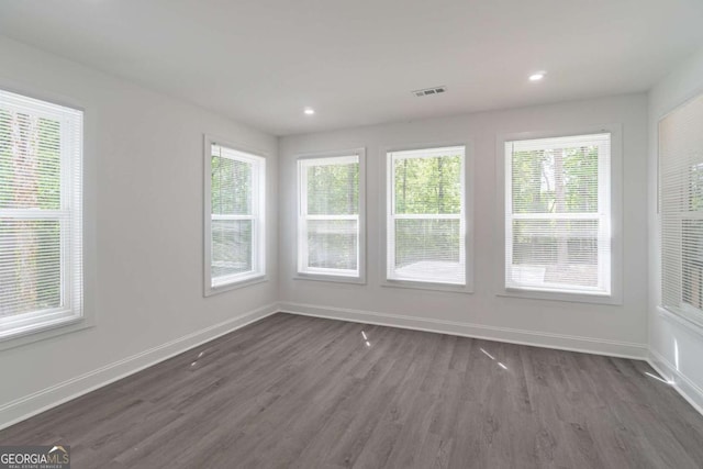 2265 Hillbriar Dr, Buford, GA 30518 - empty room featuring dark wood finished floors, baseboards, and recessed lighting