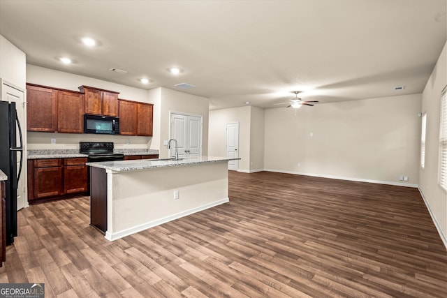 kitchen featuring black appliances, a sink, ceiling fan, dark wood-style flooring, and recessed lighting