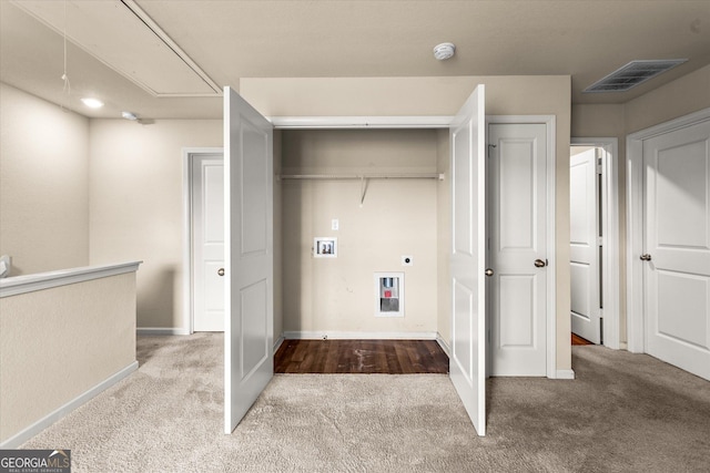 laundry area featuring attic access, carpet flooring, washer hookup, hookup for an electric dryer, and baseboards