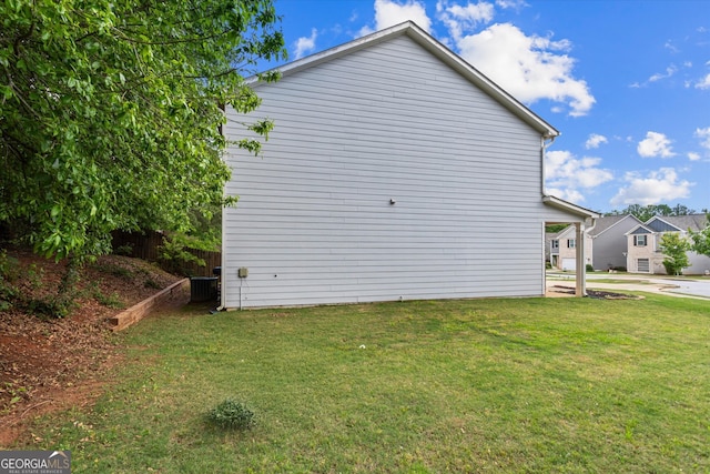 view of property exterior featuring a lawn