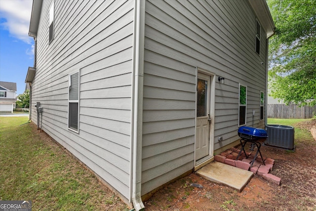 view of home's exterior with central air condition unit