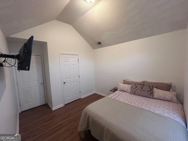 110 Katama Way, Pooler, GA 31322 - bedroom featuring vaulted ceiling, wood finished floors, and a textured ceiling