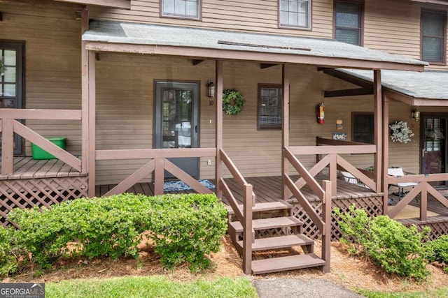 property entrance with covered porch