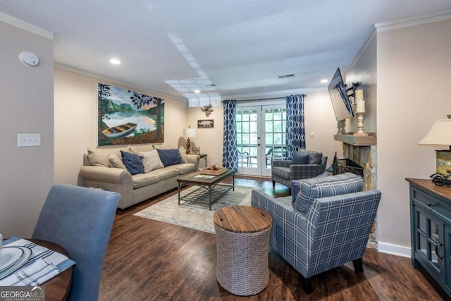 living area with ornamental molding, dark wood finished floors, french doors, and recessed lighting