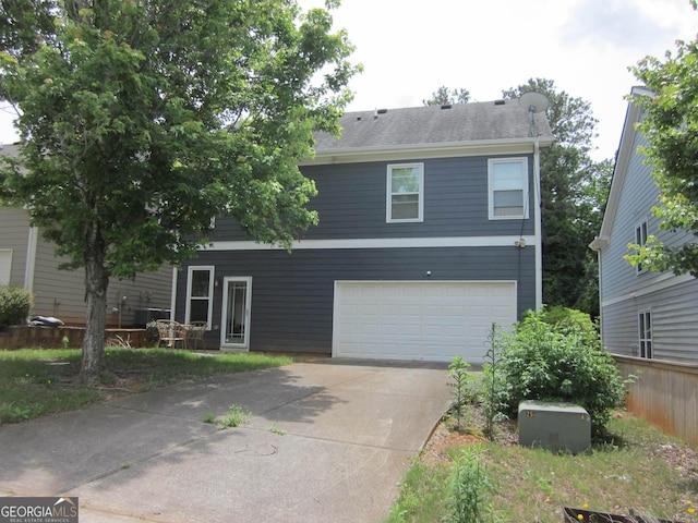 1527 Princeton Ave, College Park, GA 30337 - view of front facade with an attached garage and driveway